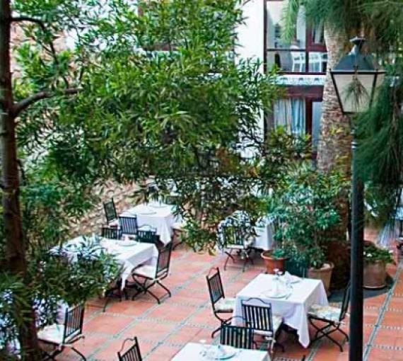 Plan Amigo de Clínica Baviera. Hotel Nou Roma comedor